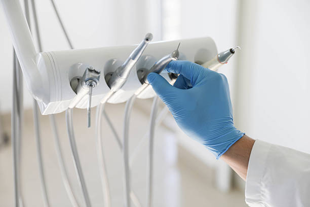 Professional Tooth Extraction technician working in Sheridan, AR